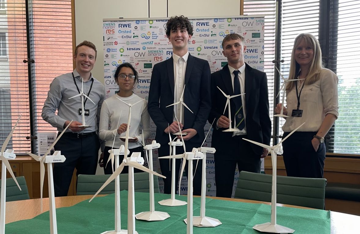 Students in Portcullis House, with John Wallace and Naomi Harris