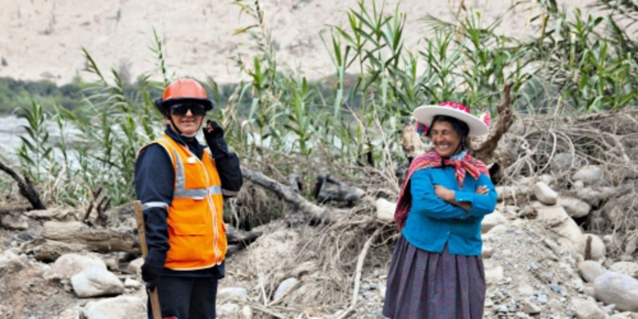 Construction worker with local woman