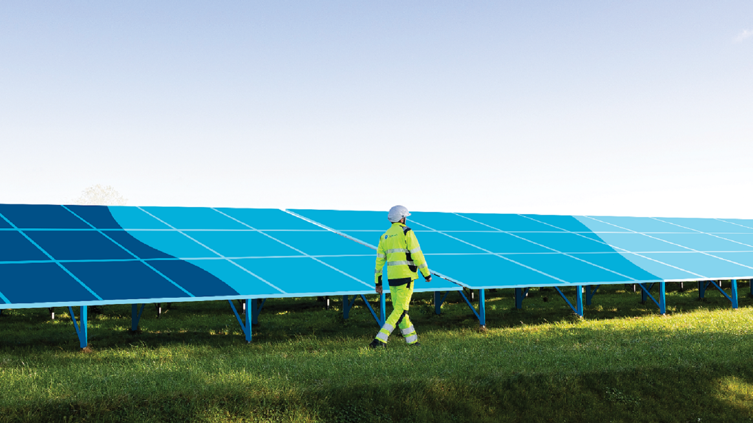 Man walking next to a solar panel